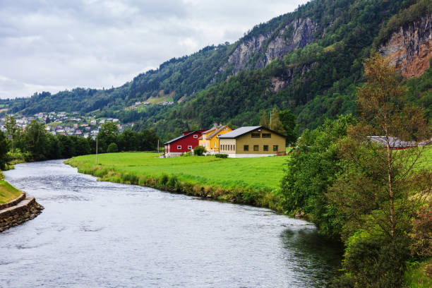 istock beautiful houses by the river, Norway 1292093259