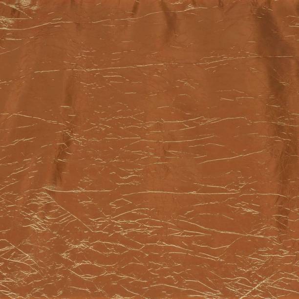 istock Brown wrinkled wrapping paper texture for background 1292099873