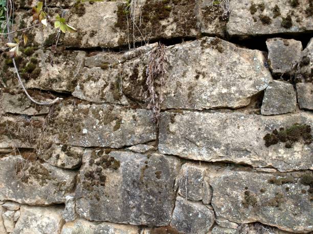 istock Background of the stone rock texture. Natural masonry without mortar and cement 1292101439