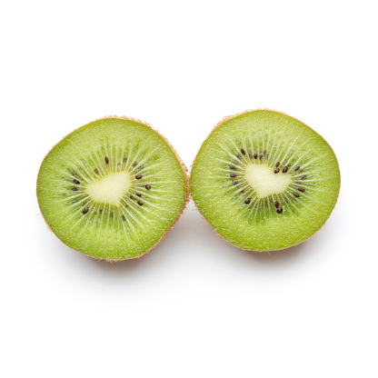 Ripe half kiwi fruit isolated on white background