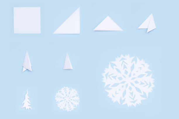 istock Step by step instruction how to make paper snowflake. DIY concept. 1292107295