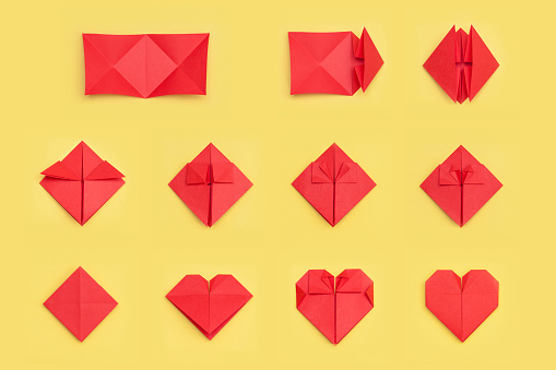 Step by step instruction how to make paper heart. DIY concept.