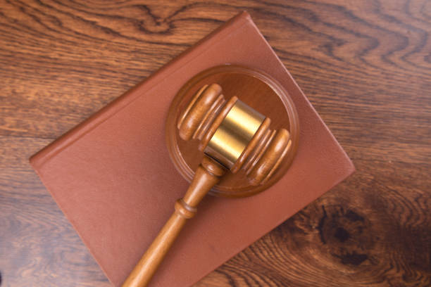 istock wooden judge on the book 1292107795