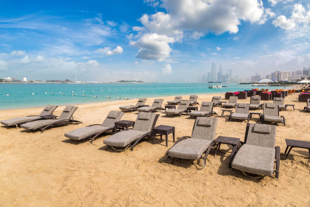 istock Sunbeds at the beach in Abu Dhabi 1292108388