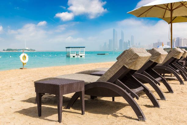 istock Sunbeds at the beach in Abu Dhabi 1292108392