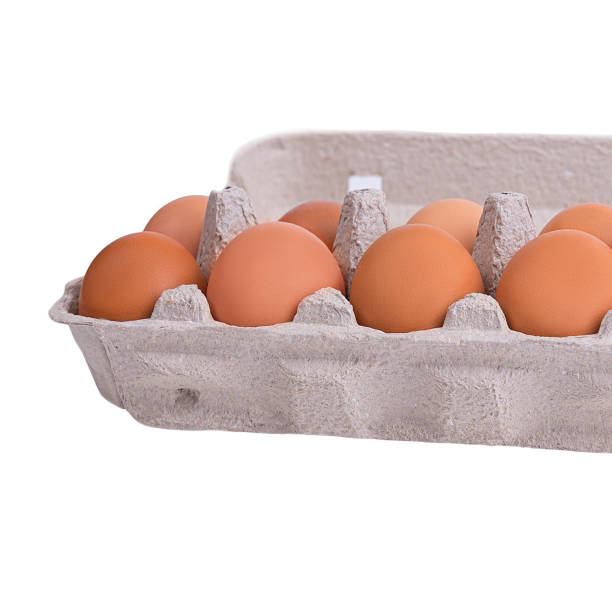 istock Ten brown eggs in a carton package 1292112154