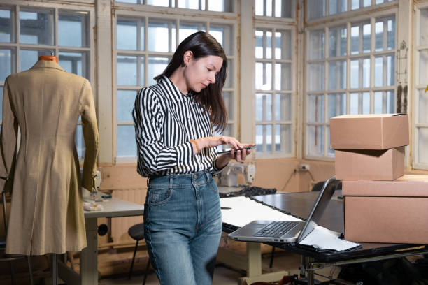 istock Small business, tailor shop, costume designer's workshop. 1292112931