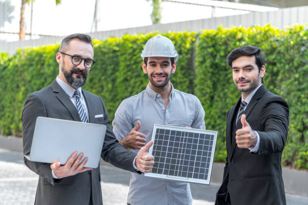 istock Two Businessman and power engineering talking and checking quality power solar cell with laptop computor on site new project power solution business 1292116333