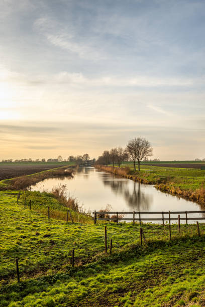 istock Idyllic Dutch polder landscape in winter 1292118285