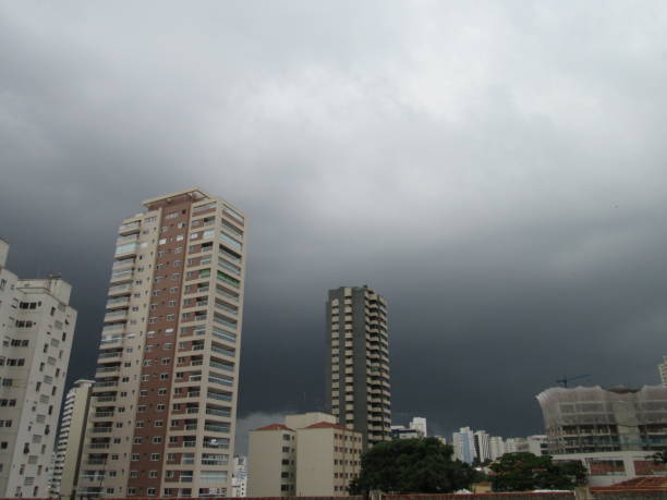 istock Dark sky of a city before the storm 1292119362