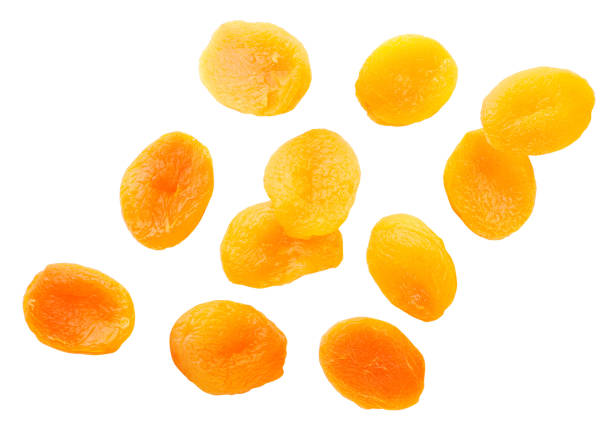 istock Dried apricots flying on a white background, levitating. Isolated 1292119658