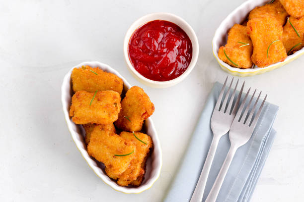 istock Chicken Nuggets with Tomato Ketchup Directly Above Photo 1292120806