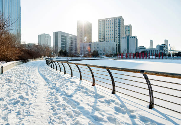 City sidewalk in snowy day.