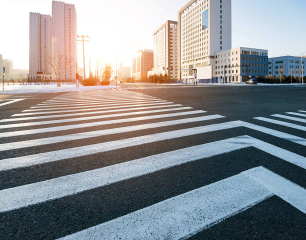 istock Zebra crossing and modern buildings in winter 1292124167