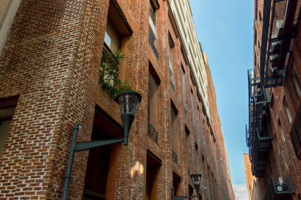istock Brick buildings with and a lamppost 1292125252