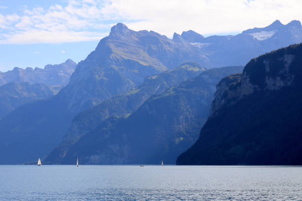 istock Impressive mountain range over Lake Lucerne, Vierwaldstattersee as seen from Brunnen 1292125678