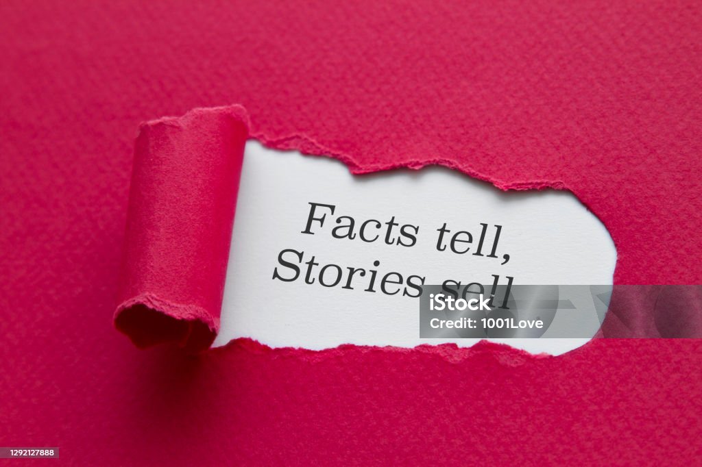 Facts tell, stories sell. Facts tell, stories sell word written under torn paper. Storytelling Stock Photo