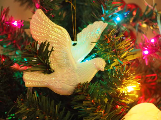 istock Dove of Peace on the Christmas Tree 1292129866
