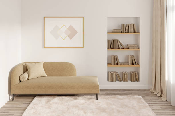 Modern room with a horizontal poster above a couch with a pillow, a niche with books, a window with curtains, a fluffy carpet on a wooden floor. Front view.