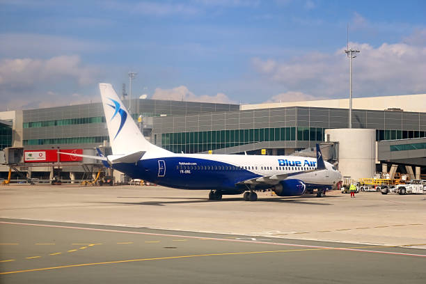Blue Air airplane in Larnaca airport. Blue Air is a Romanian airline headquartered in Bucharest. Since 2016, it has become the largest Romanian airline by scheduled passengers flown. In 2017, Blue Air carried over 5 million passengers, a 40% increase over stock photo