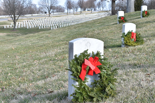 Military gravesite decorated for Wreaths Across American in Jefferson Barracks National Cemetery December 18th 2020