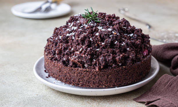 istock Homemade chocolate cake with cherry and whipped cream. Cake Mink mole or Mole hole cake. 1292132749