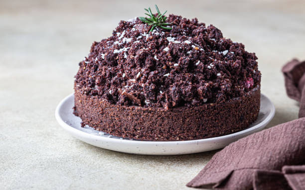 istock Homemade chocolate cake with cherry and whipped cream. Cake Mink mole or Mole hole cake. 1292132897