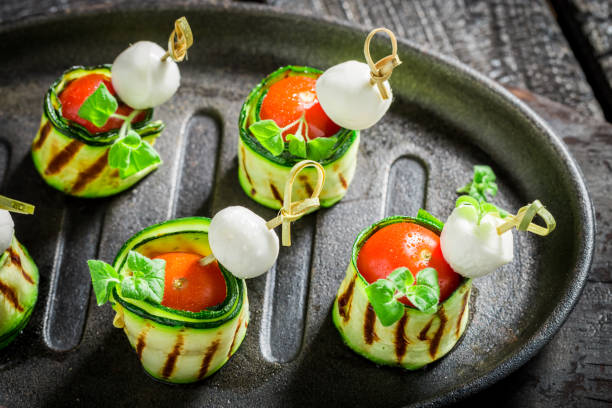 istock Various finger food with cheese, tomato and courgette 1292133128