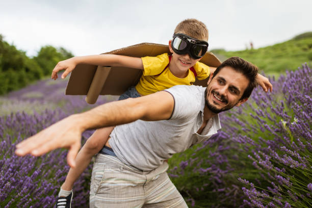 istock Father and son enjoying on lavender field 1292133235