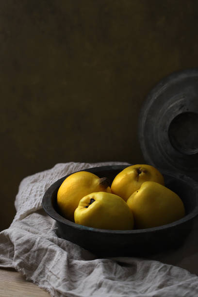 istock Rustic Style Table Set Up Quince in metal plate 1292135903