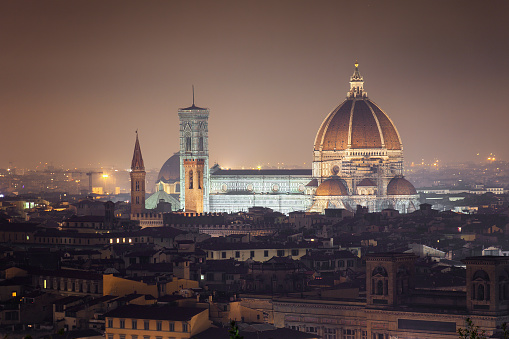 Florence cathedral Duomo Santa Maria, with Brunelleschi's dome, at dusk with artificial lighting, Florence, Italy