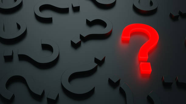 istock Red glowing question mark on a background black and grey signs. 3D Rendering 1292144863