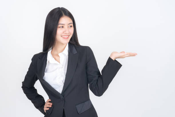 istock Portrait beautiful working asian woman with happiness posing her empty hands with blank space for advertising 1292146052