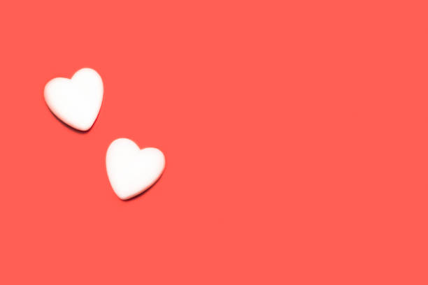 istock Hearts on a red background. Valentine's day concept. 1292147128