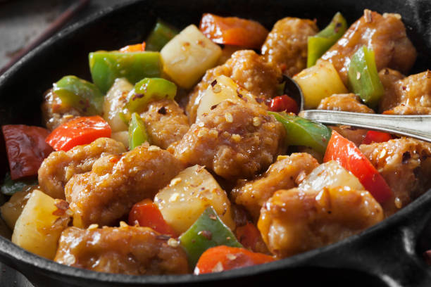 Sweet and Sour Pork Sweet and Sour Pork with Steamed Rice and Dumplings chinese food stock pictures, royalty-free photos & images