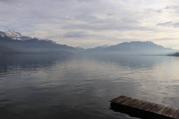 istock Lake Annecy under a cloudy sky 1292150824