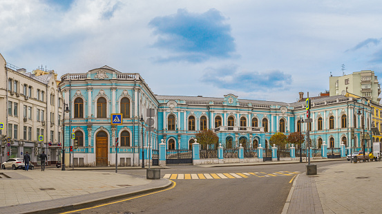 Moscow / Russia - April 30, 2020: Desert Myasnitskaya Street on a spring day during the coronavirus pandemic with a 18th-century monument by the Saltykov-Chertkov estate.