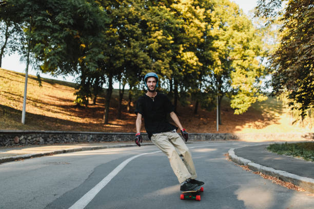 istock The guy rides on a board at sunset. 1292152677