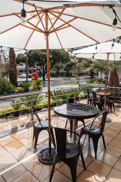 istock a garden table outside a restaurant with two dark chairs 1292153959