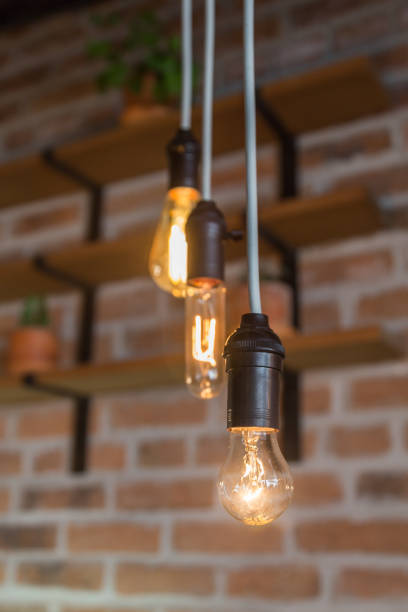 istock several spotlights with yellow light hung with wire, modern interior decoration 1292153980