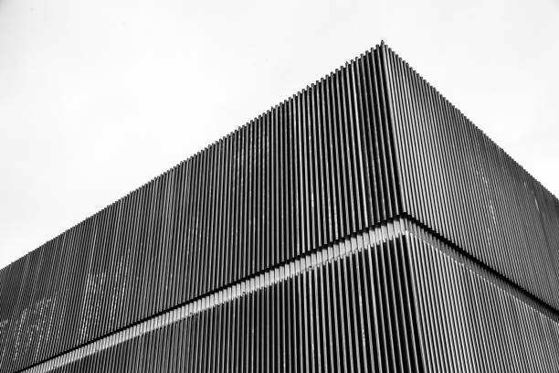 istock Modern buildings against a grey sky in Munich 1292166388
