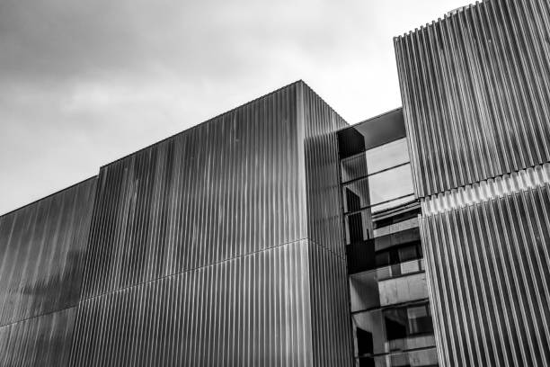 istock Modern buildings against a grey sky in Munich 1292166528
