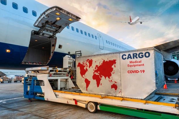 istock Loading the medical supply container in the cargo airplane. 1292168983