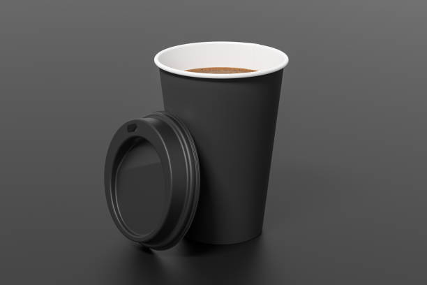 istock Black take away coffee paper cup mock up with opened black lid on black background. 1292171143