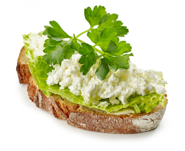 istock slice of bread with cottage cheese isolated on white background 1292171162