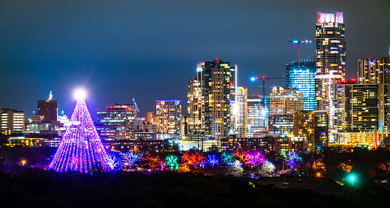 Happy Holidays and Christmas Trail of Lights View of Austin Texas Cityscape at night Skyline of the Capital Cities - Merry Christmas Austin Texas Cityscape Trail of Lights Skyline View