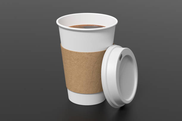 istock White take away coffee paper cup mock up with opened white lid with holder on black background. 1292171928