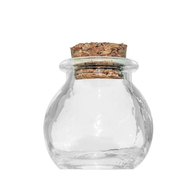 istock Empty glass transparent jar with cork on white background. 1292175316