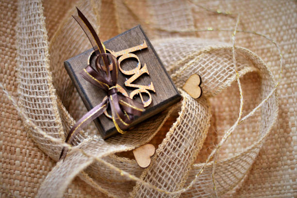 istock Jute ribbons and romantic box written 
