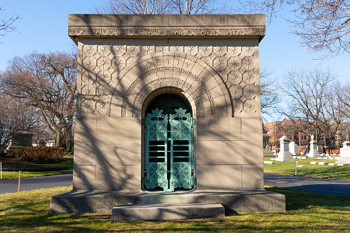 Chicago, Illinois / United States - December 9th, 2020: The Carrie Eliza Getty Tomb by architect Louis Sullivan in Graceland Cemetery.